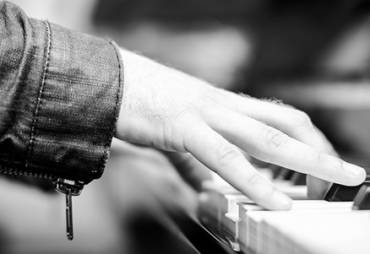 8 Unexpected Benefits of Playing the Piano